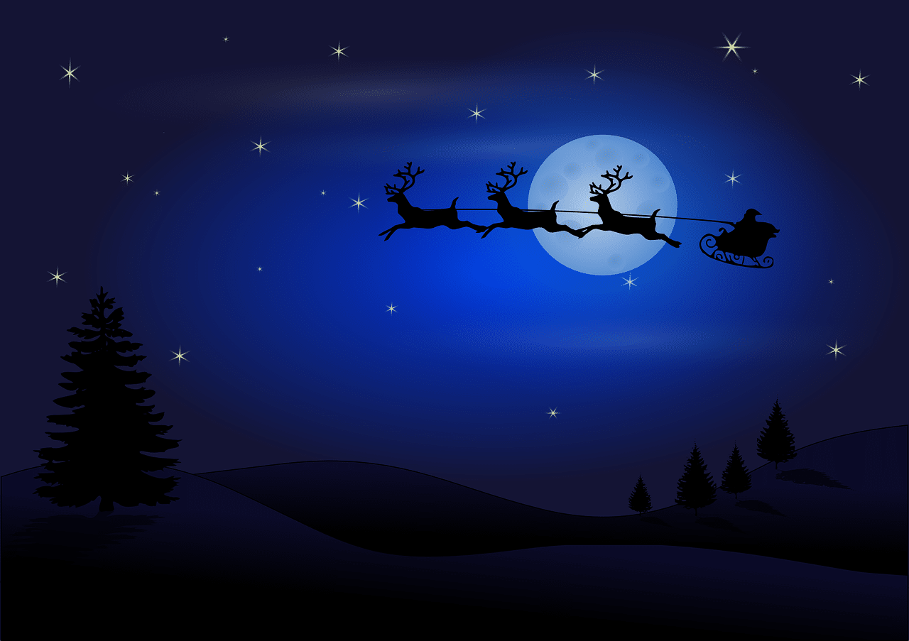 Carriole du père Noël devant la lune